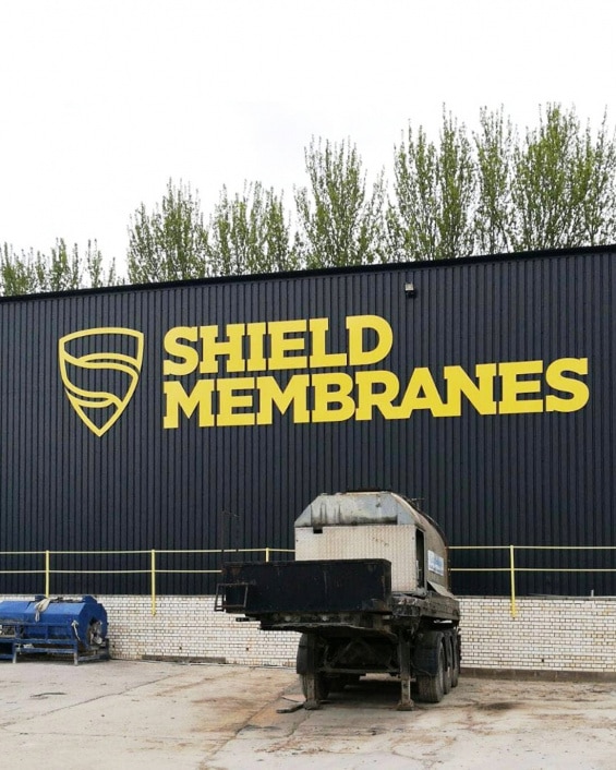 Shield Membranes logo building